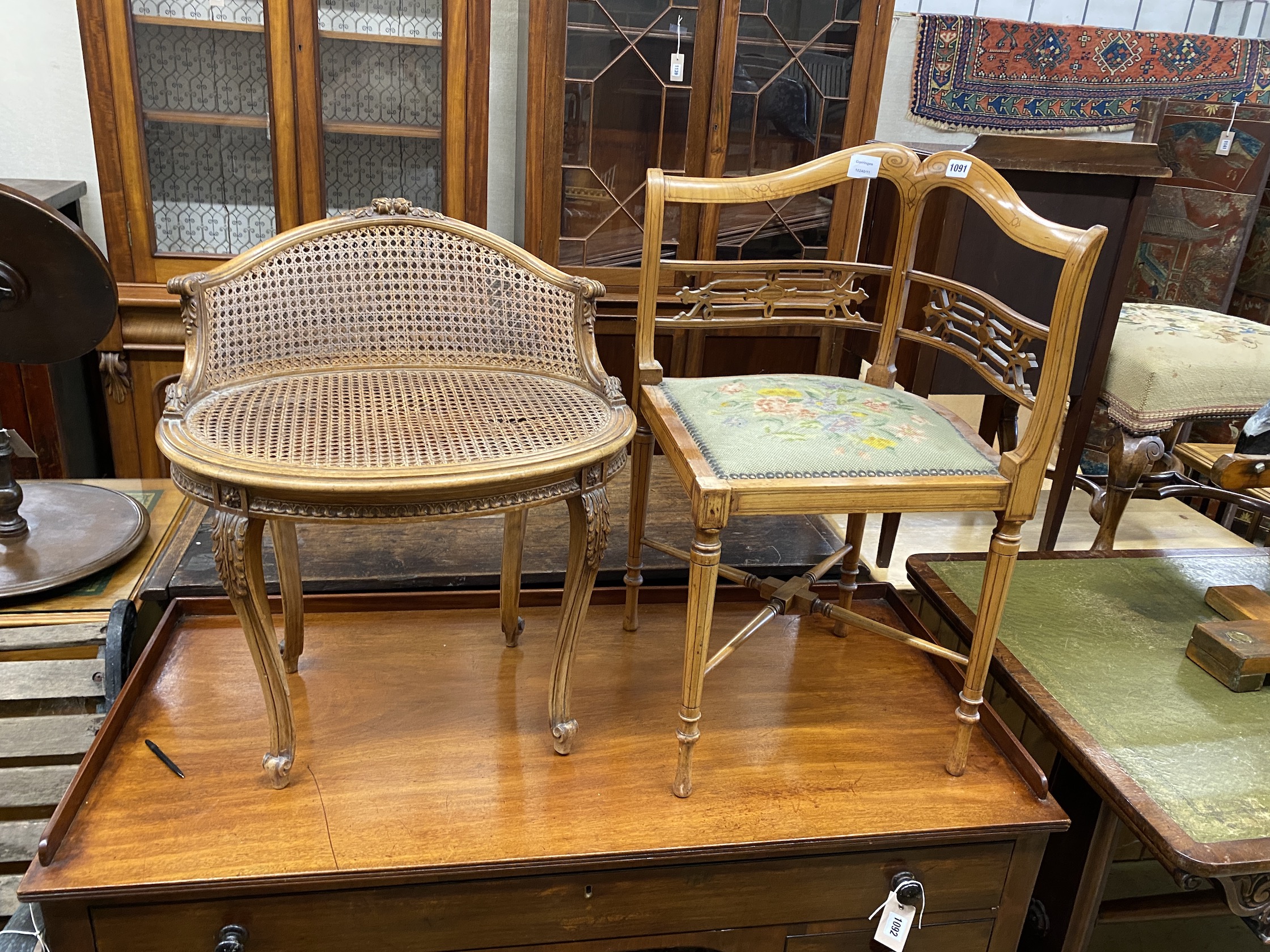 A French oval caned walnut oval seat chair and an inlaid satinwood corner chair